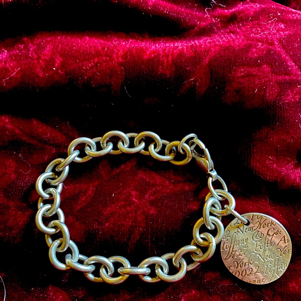 Tiffany & Co 7 inch 925 sterling charm bracket with retired wave charm